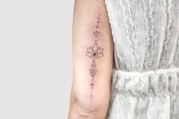 lotus fine line tattoo