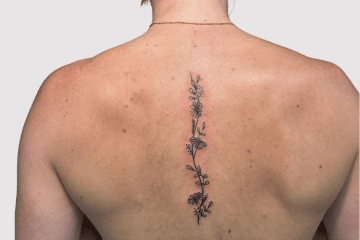 flower fine line tattoo