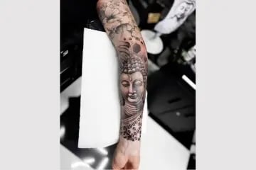 religious sleeve tattoo