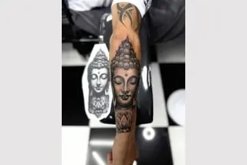Buddha religious sleeve tattoo