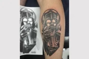 religious sleeve tattoo