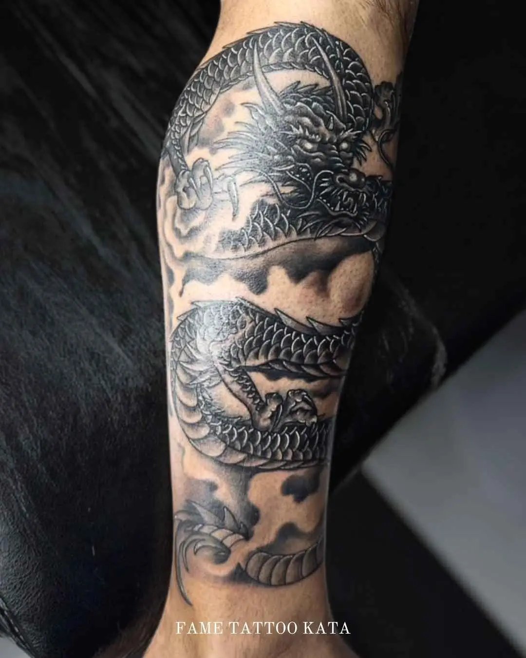 Japanese dragon tattoo by fame tattoo