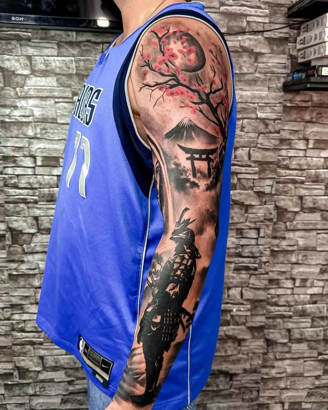 Japanese full arm tattoo by fame tattoo