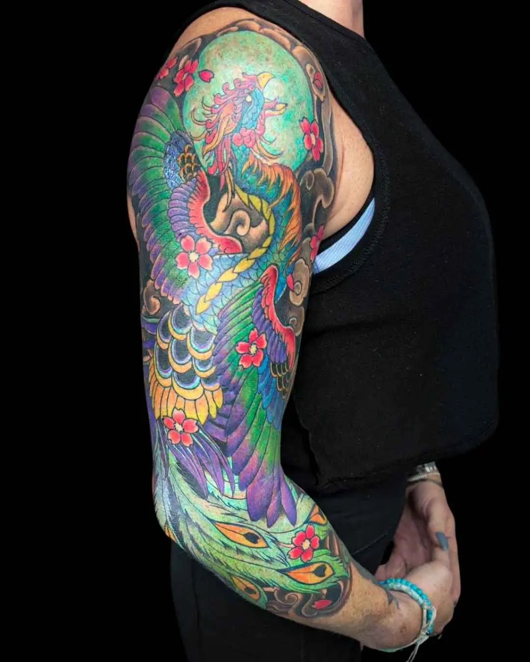 Japanese full arm tattoo by fame tattoo