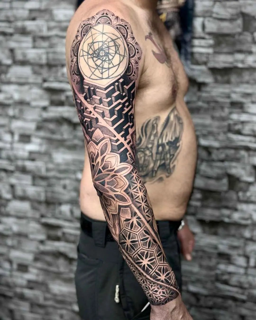 Mandala, geometric and polynesian tattoo by fame tattoo