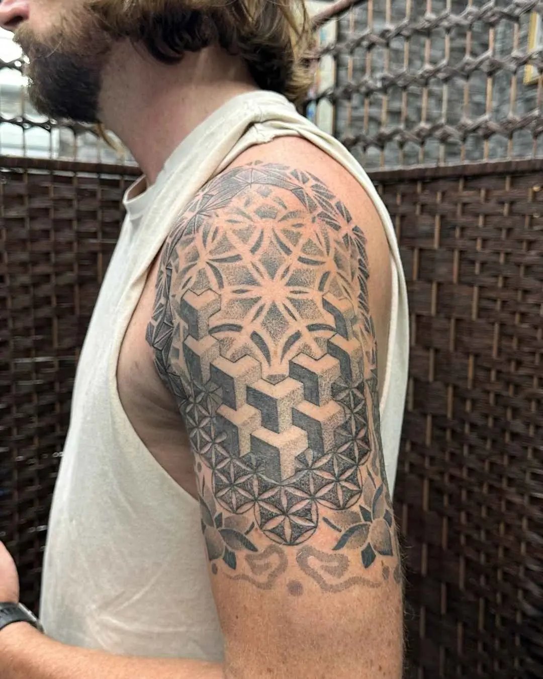 geometric and mandala tattoo by fame tattoo