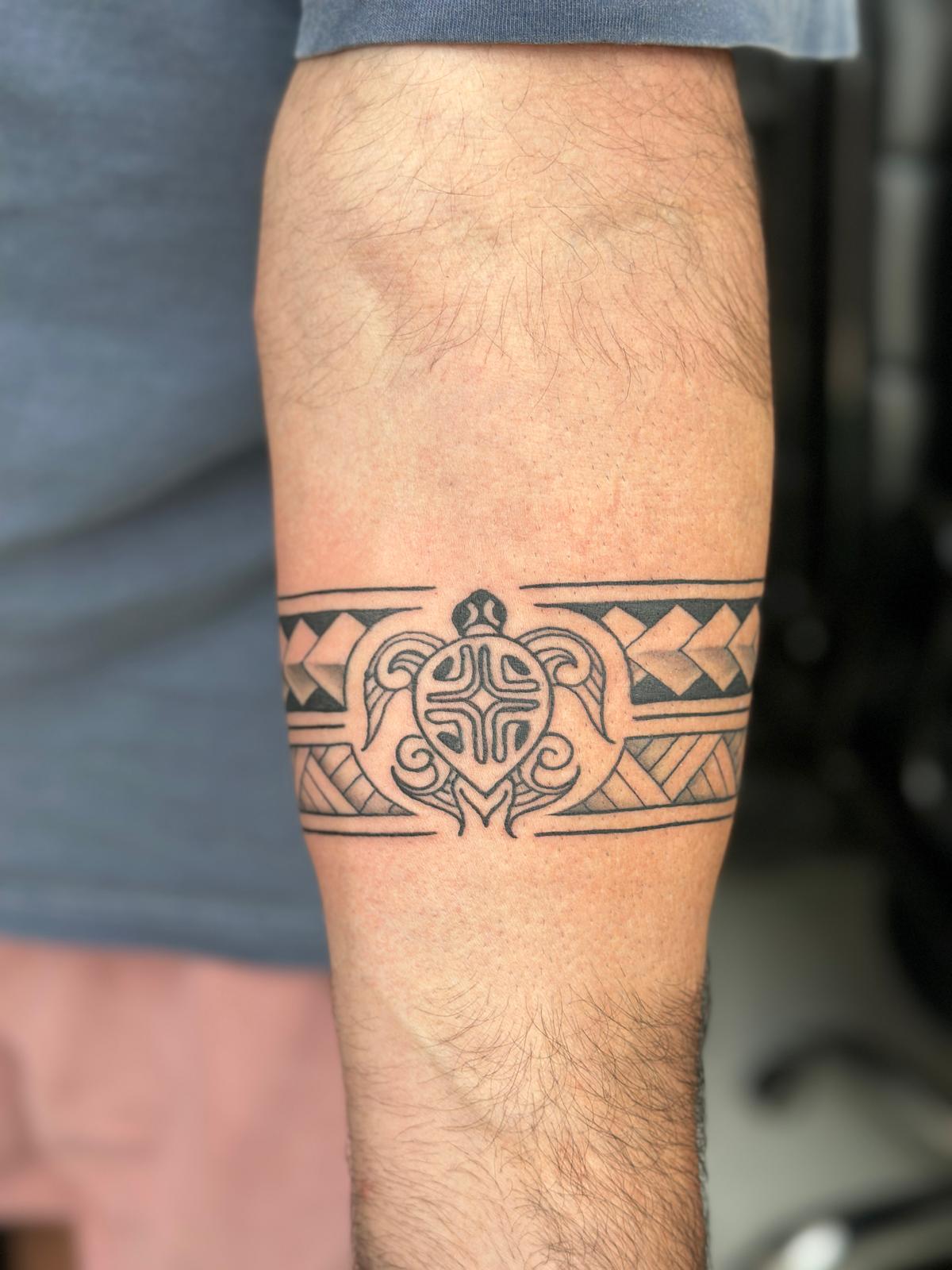Mandala, geometric and Polynesian tattoo by fame tattoo
