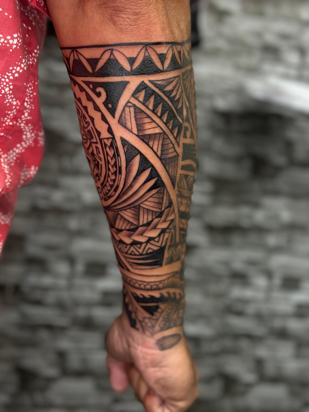 Mandala, geometric and Polynesian tattoo by fame tattoo