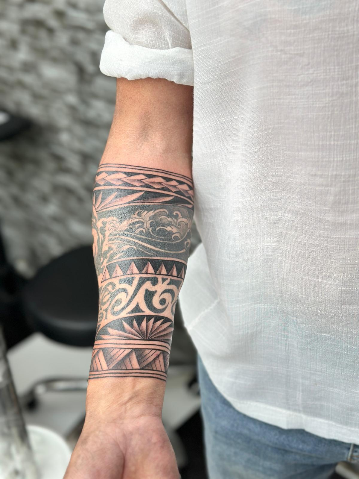 Mandala, geometric and Polynesian tattoo by fame tattoo
