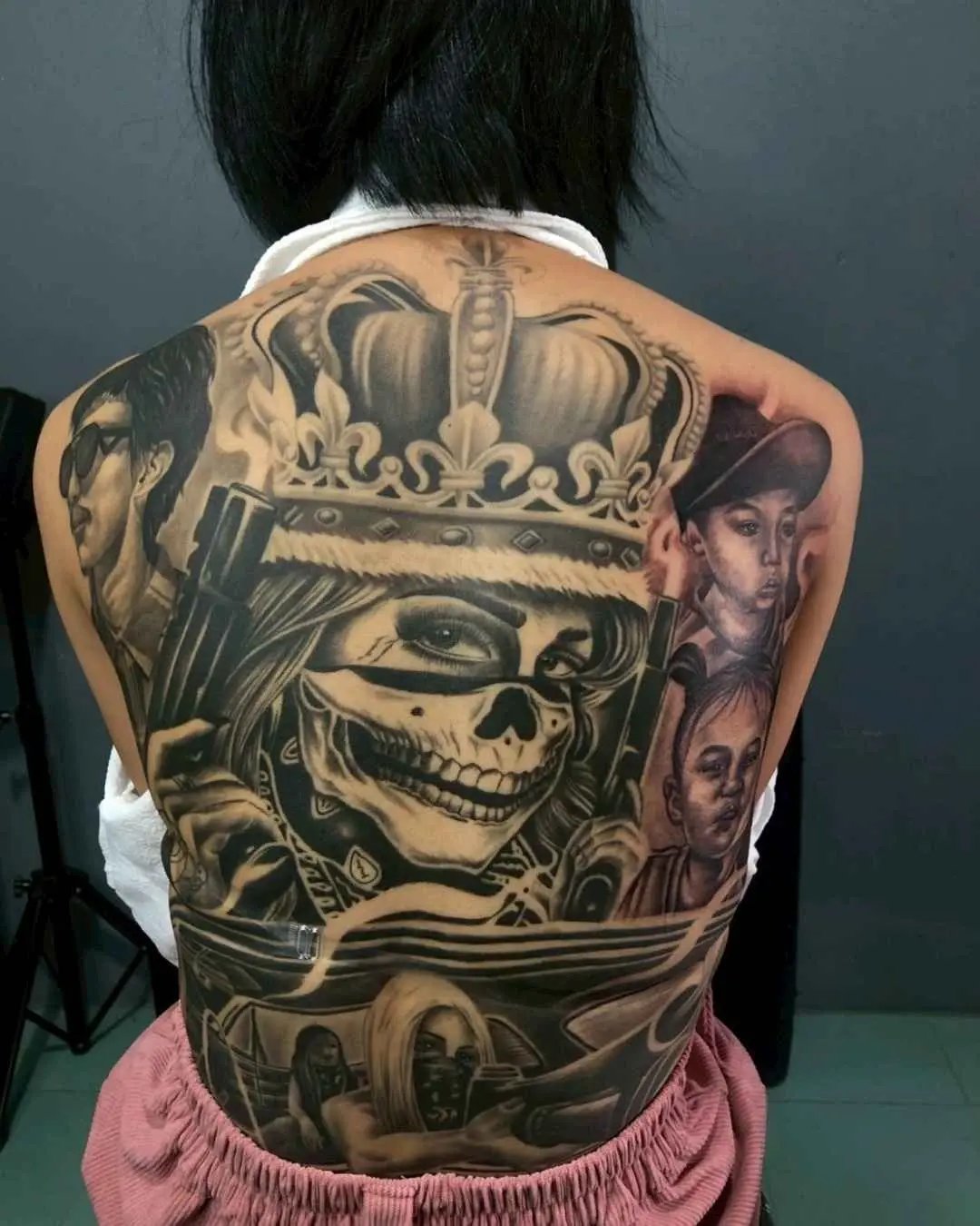 realism tattoo, full back by fame tattoo