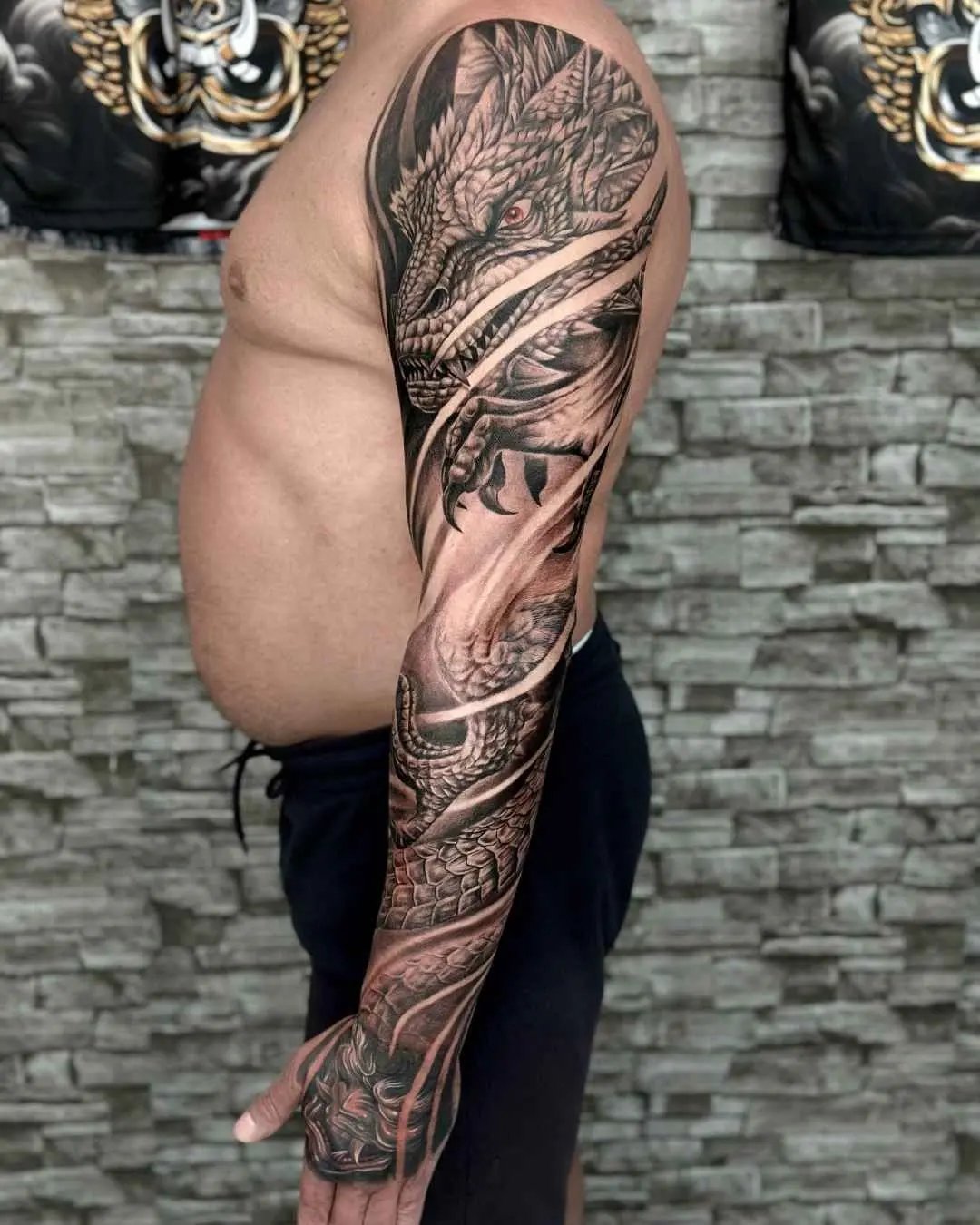 realism tattoo, full arm tattoo by fame tattoo