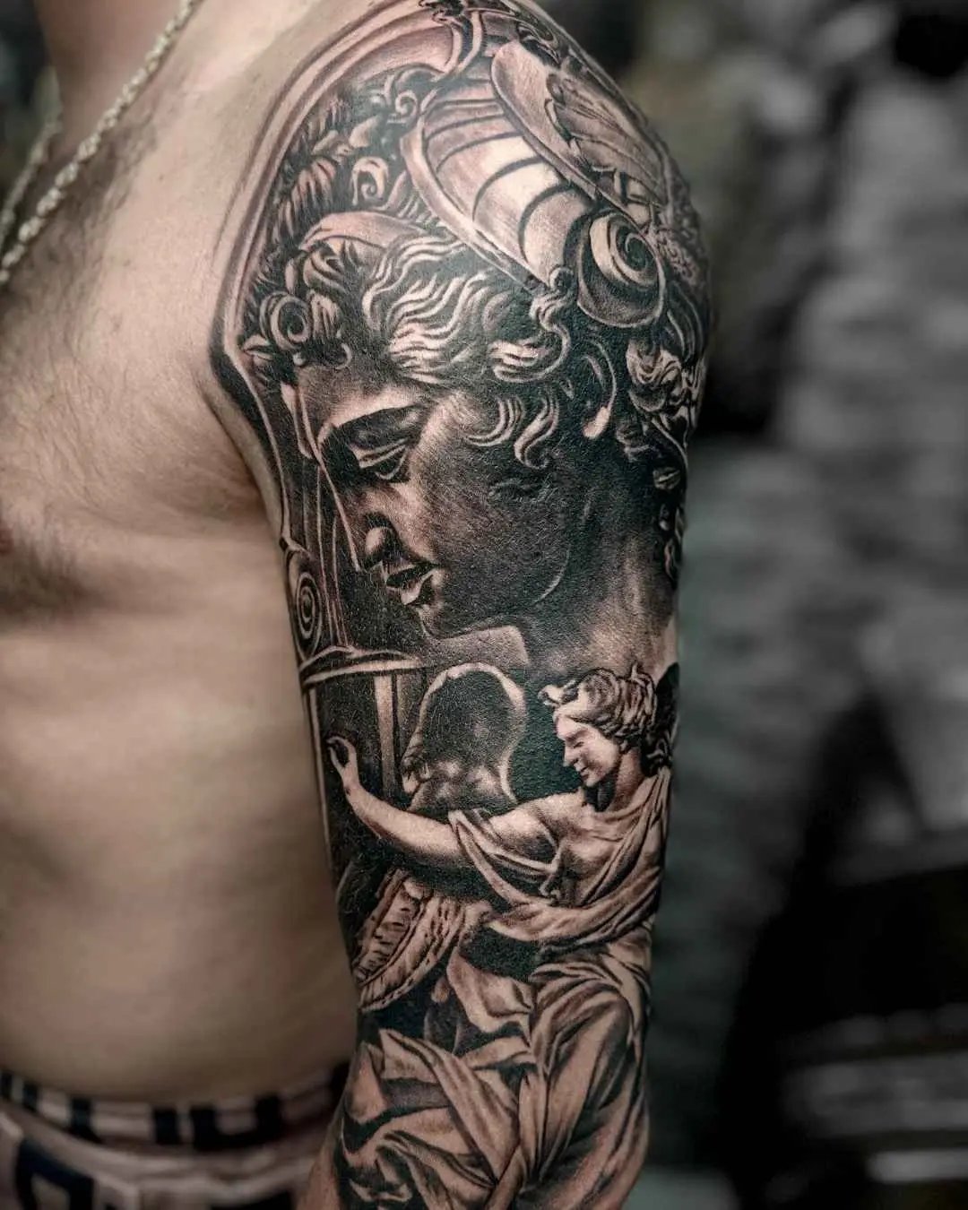 realism tattoo, full arm by fame tattoo