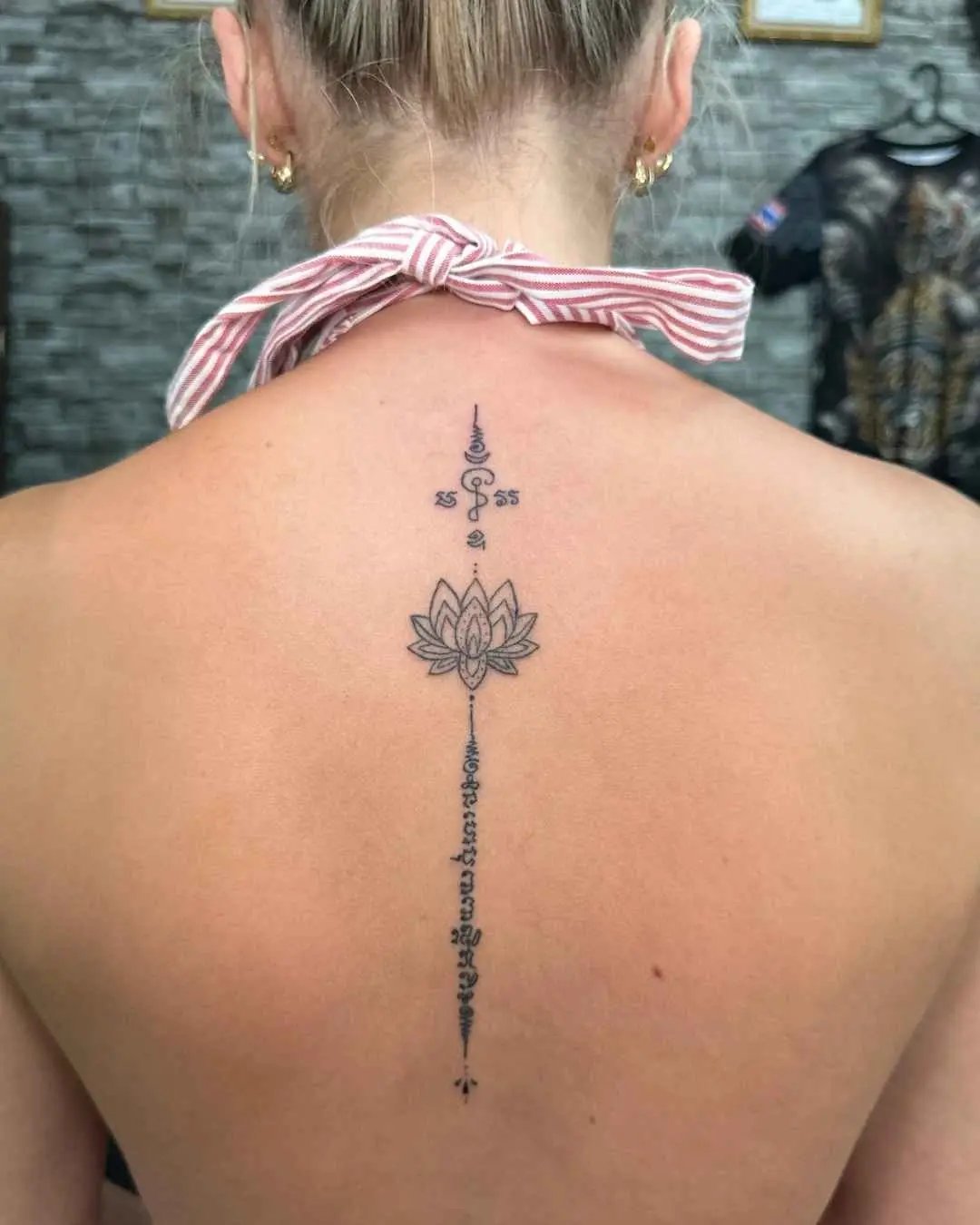 lotus fine line bamboo tattoo by fame tattoo