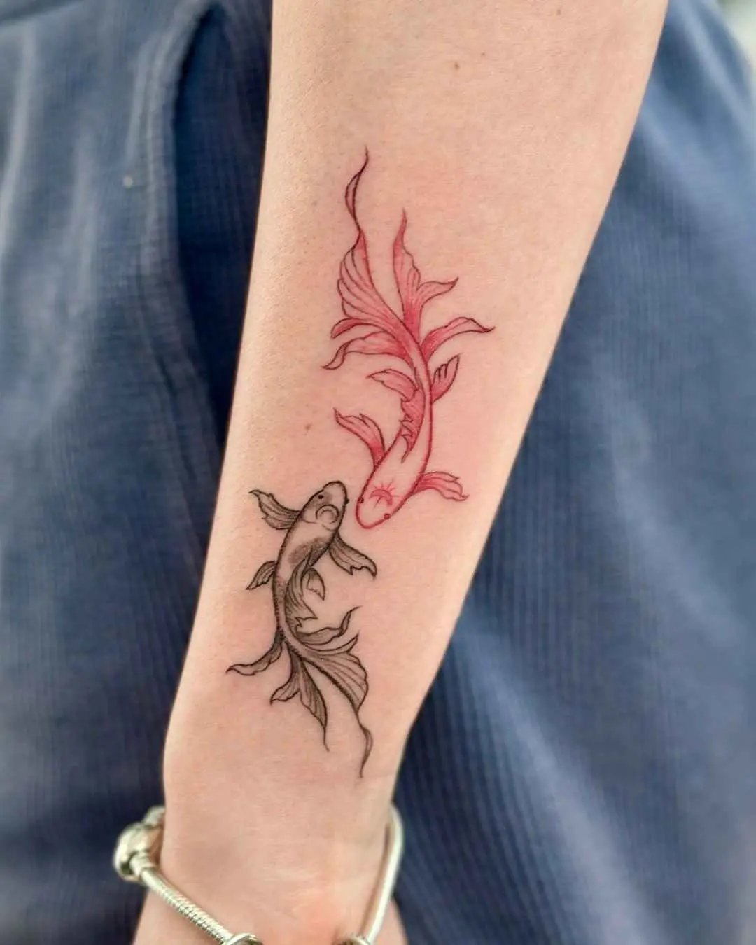 khao fish fine line tattoo by fame tattoo