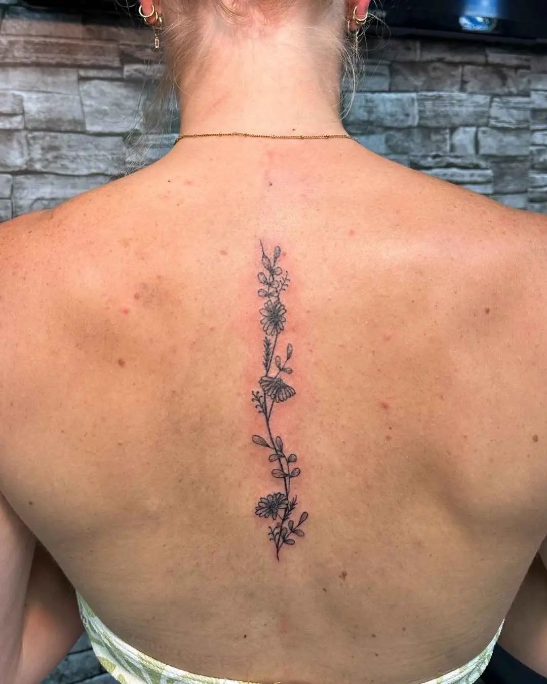 fine line tattoo by fame tattoo