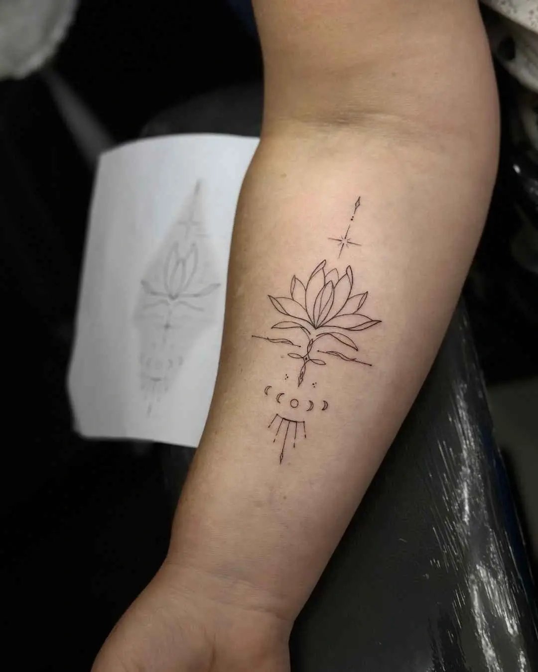 lotus fine line tattoo by fame tattoo